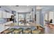 Bright and modern kitchen featuring sleek granite countertops and stainless steel appliances at 3252 Bellflower Way, Lakeland, FL 33811
