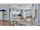 Spacious kitchen featuring granite countertops and a breakfast bar with seating at 3252 Bellflower Way, Lakeland, FL 33811