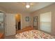 Bedroom with walk-in closet offers comfort and functionality, featuring a ceiling fan at 3359 Sanoma Dr, Lakeland, FL 33811