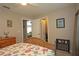 Bright bedroom with neutral colors, closet access, and a ceiling fan at 3359 Sanoma Dr, Lakeland, FL 33811
