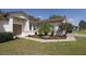 Inviting front entrance with manicured landscaping and a double-door entryway at 3359 Sanoma Dr, Lakeland, FL 33811