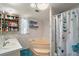 Bathroom featuring a corner tub, a separate shower, and dual sinks with plenty of storage space at 36912 Skycrest Blvd, Fruitland Park, FL 34731
