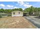 Well-maintained home with a covered carport and tidy landscaping at 36912 Skycrest Blvd, Fruitland Park, FL 34731