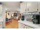 Charming kitchen flowing into a cozy living area perfect for entertaining and everyday Gathering living at 36912 Skycrest Blvd, Fruitland Park, FL 34731