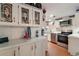 Modern kitchen featuring stainless steel appliances, crisp white cabinets, and ample counter space at 36912 Skycrest Blvd, Fruitland Park, FL 34731