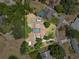 Aerial view of a home with a pool and spacious yard at 3805 Gaines Dr, Winter Haven, FL 33884