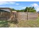 Wooden privacy fence surrounds the backyard providing security and seclusion at 3805 Gaines Dr, Winter Haven, FL 33884