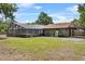 Exterior shot of a home with a large screened-in pool area at 3805 Gaines Dr, Winter Haven, FL 33884