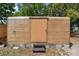 Exterior view of a shed featuring horizontal siding and a simple, functional design at 3805 Gaines Dr, Winter Haven, FL 33884