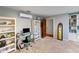 Spacious bedroom featuring a desk, built-in bookcases, and plush carpet at 3812 Cheverly E Dr, Lakeland, FL 33813