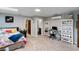 Spacious bedroom featuring a ceiling fan, skylights, neutral walls, and a desk at 3812 Cheverly E Dr, Lakeland, FL 33813
