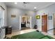 Golf simulator room with view of the patio and golf training equipment at 3812 Cheverly E Dr, Lakeland, FL 33813
