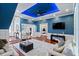 Open-concept living room featuring hardwood floors, recessed lighting, and a striking blue accent ceiling at 3812 Cheverly E Dr, Lakeland, FL 33813