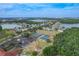 Aerial view of the community amenities including the tennis and basketball courts and playground at 3852 Serenade Ln, Lakeland, FL 33811