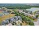 Community aerial view showcasing the homes, community amenities, and nearby lakes at 3852 Serenade Ln, Lakeland, FL 33811