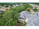 Aerial view of the property showcasing the back of the home and the screened in patios at 3852 Serenade Ln, Lakeland, FL 33811