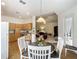 Inviting dining area connected to the kitchen and living room, showcasing an open layout at 3852 Serenade Ln, Lakeland, FL 33811