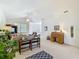 Bright living room with neutral walls, ceiling fan, and open layout at 3852 Serenade Ln, Lakeland, FL 33811