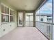 Covered outdoor porch featuring screen and views of the community's outdoor space at 3852 Serenade Ln, Lakeland, FL 33811
