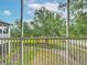 Relaxing screened porch providing views of mature trees and well-maintained landscaping at 3852 Serenade Ln, Lakeland, FL 33811