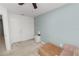 Bedroom featuring a plush armchair, soft carpet, and ample natural light at 3857 Hampstead Ln, Lakeland, FL 33810