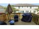 Outdoor deck with patio furniture, grill, and views of the backyard at 3857 Hampstead Ln, Lakeland, FL 33810