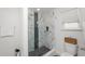 Luxurious glass shower featuring marble tiling, built-in niche, and modern fixtures at 3857 Hampstead Ln, Lakeland, FL 33810