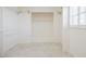 Walk in closet with built in shelves and clothing rods, window provides natural light at 3880 Cleveland Heights Blvd, Lakeland, FL 33813