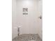 Walk in shower with mosaic floor and built in seat in updated bathroom at 3880 Cleveland Heights Blvd, Lakeland, FL 33813