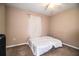 This bedroom features carpet floors, a ceiling fan, and a large window for natural light at 3942 Warbler Dr, Winter Haven, FL 33880