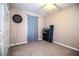 This bedroom features carpet floors, a ceiling fan, and a closet for storage at 3942 Warbler Dr, Winter Haven, FL 33880