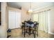 Dining area with table, four chairs and neutral walls at 3942 Warbler Dr, Winter Haven, FL 33880