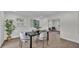 Dining room features hardwood floors, ample natural light, neutral paint and contemporary decor at 4028 S Wellington Dr, Lakeland, FL 33813