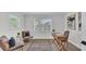 Bright office space featuring lots of natural light, a decorative rug, and modern furnishings at 4028 S Wellington Dr, Lakeland, FL 33813