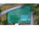 Aerial view of the property with a highlighted lot line at 410 Orange St, Bradley, FL 33835