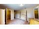 Bedroom featuring carpet, furniture, and a walk-in closet at 410 Orange St, Bradley, FL 33835