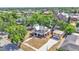Spacious two-story home boasting a large front porch and a detached two-car garage, blending classic architecture with modern amenities at 410 S Broadway Ave, Bartow, FL 33830