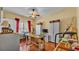 Bright and airy bedroom with hardwood floors and a ceiling fan at 410 S Broadway Ave, Bartow, FL 33830