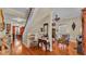 Foyer featuring wood floors, staircase, decor, and access to dining and living spaces at 410 S Broadway Ave, Bartow, FL 33830