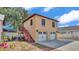 Two-car garage with bonus room above offers ample parking and additional living space at 410 S Broadway Ave, Bartow, FL 33830