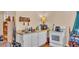 Kitchen with appliances, ample cabinet space and eat-in dining area with natural light at 410 S Broadway Ave, Bartow, FL 33830