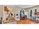Bright living area with appliances, cabinets, and eat-in dining area with natural light at 410 S Broadway Ave, Bartow, FL 33830