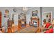 Elegant living room with hardwood floors, fireplace and chandelier at 410 S Broadway Ave, Bartow, FL 33830
