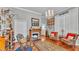 Inviting living room with a cozy fireplace and hardwood floors at 410 S Broadway Ave, Bartow, FL 33830