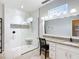 A modern bathroom features a glass-enclosed shower and vanity with sink at 4219 Windchime Ln, Lakeland, FL 33811
