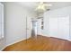 Bright bedroom with laminate floors, closet, and open entryways at 4219 Windchime Ln, Lakeland, FL 33811