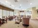 Cozy clubhouse featuring comfortable seating, natural light, and elegant decor, ideal for social gatherings and relaxation at 4219 Windchime Ln, Lakeland, FL 33811