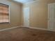 Empty room with carpet and window at 422 E Belmar St, Lakeland, FL 33803