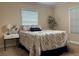 Comfortable bedroom with stylish bedding and bright, natural light at 422 E Belmar St, Lakeland, FL 33803