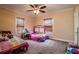 Bright bedroom with two colorful beds and ample natural light at 422 E Belmar St, Lakeland, FL 33803